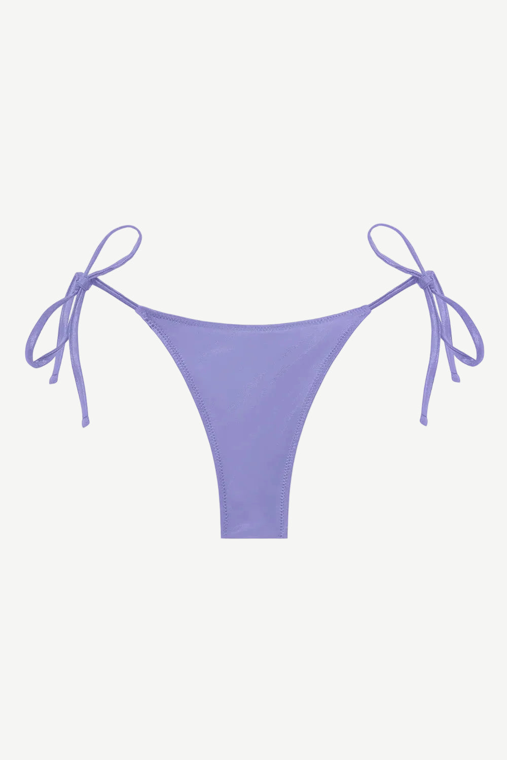 The Praia Bottom, an adjustable tie bikini bottom in a soft lavender shade and crafted from regenerated nylon for enhanced comfort, is showcased against a plain white background—a perfect option for anyone looking for eco-friendly swimwear with a customizable fit.
