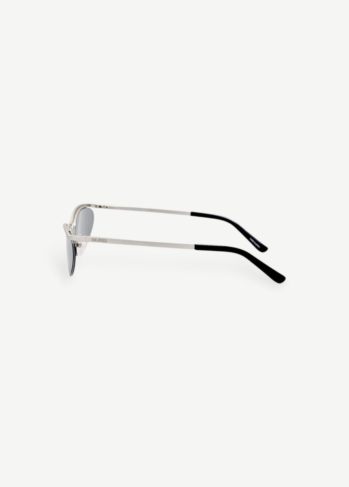 KABE SHOP INC Charlotte cat-eye sunglasses with silver-tone metal frames, dark gray lenses, and logo detailing