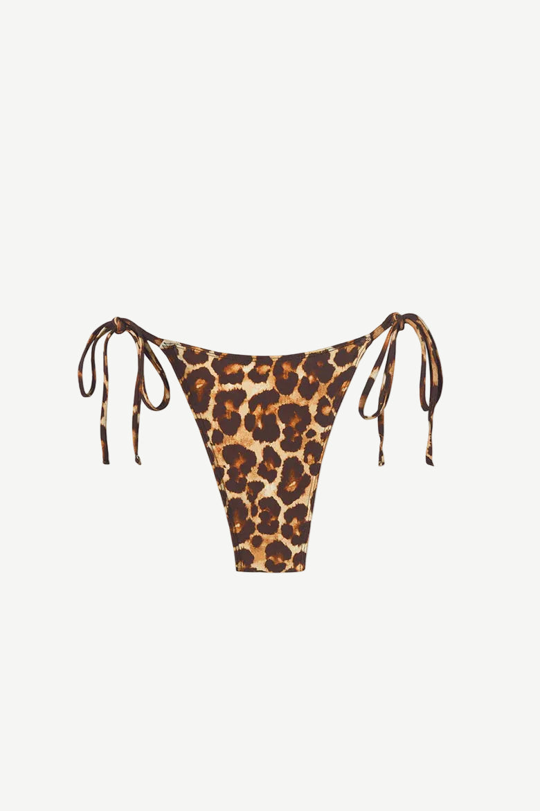 Praia Bottom in a leopard print, featuring a minimal coverage triangle bikini design with adjustable side ties, displayed on a white background.