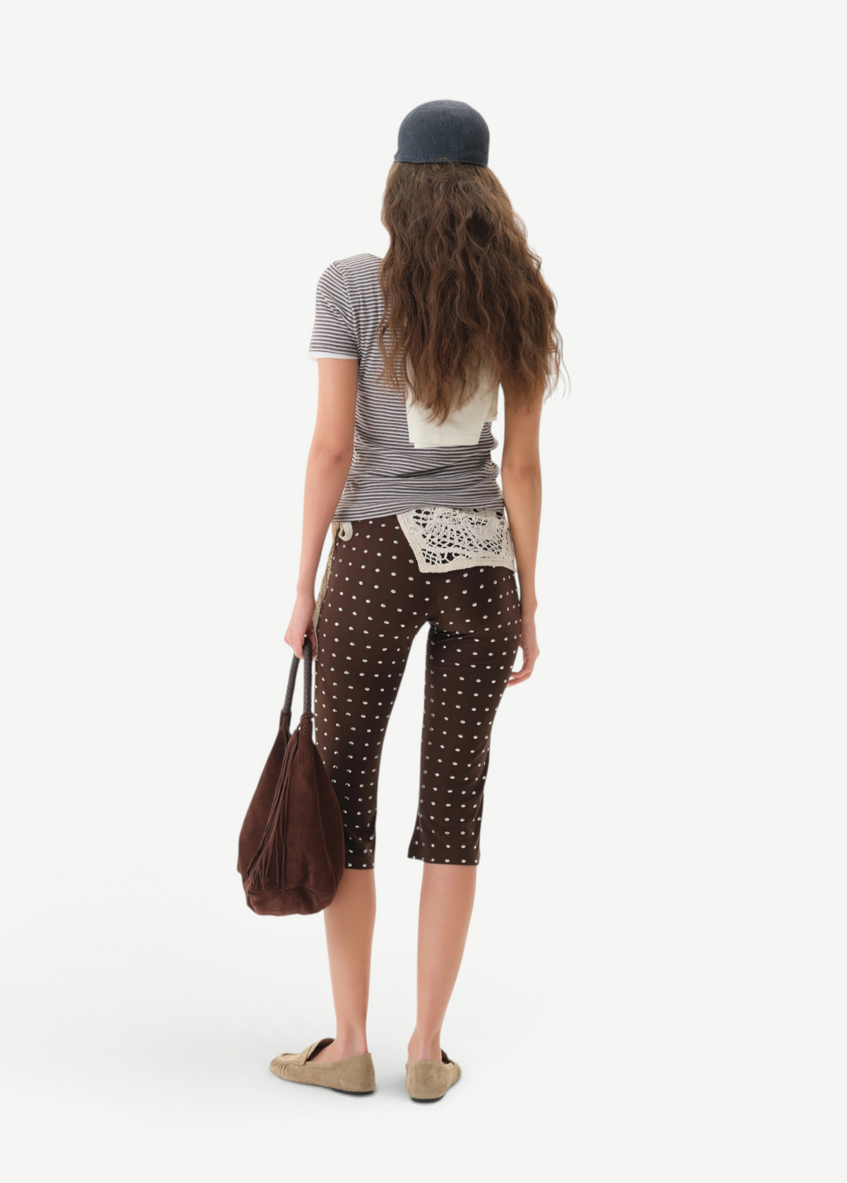 KABE SHOP INC Gianna pants in brown with white polka dots, featuring a flared silhouette and crochet waist detail.