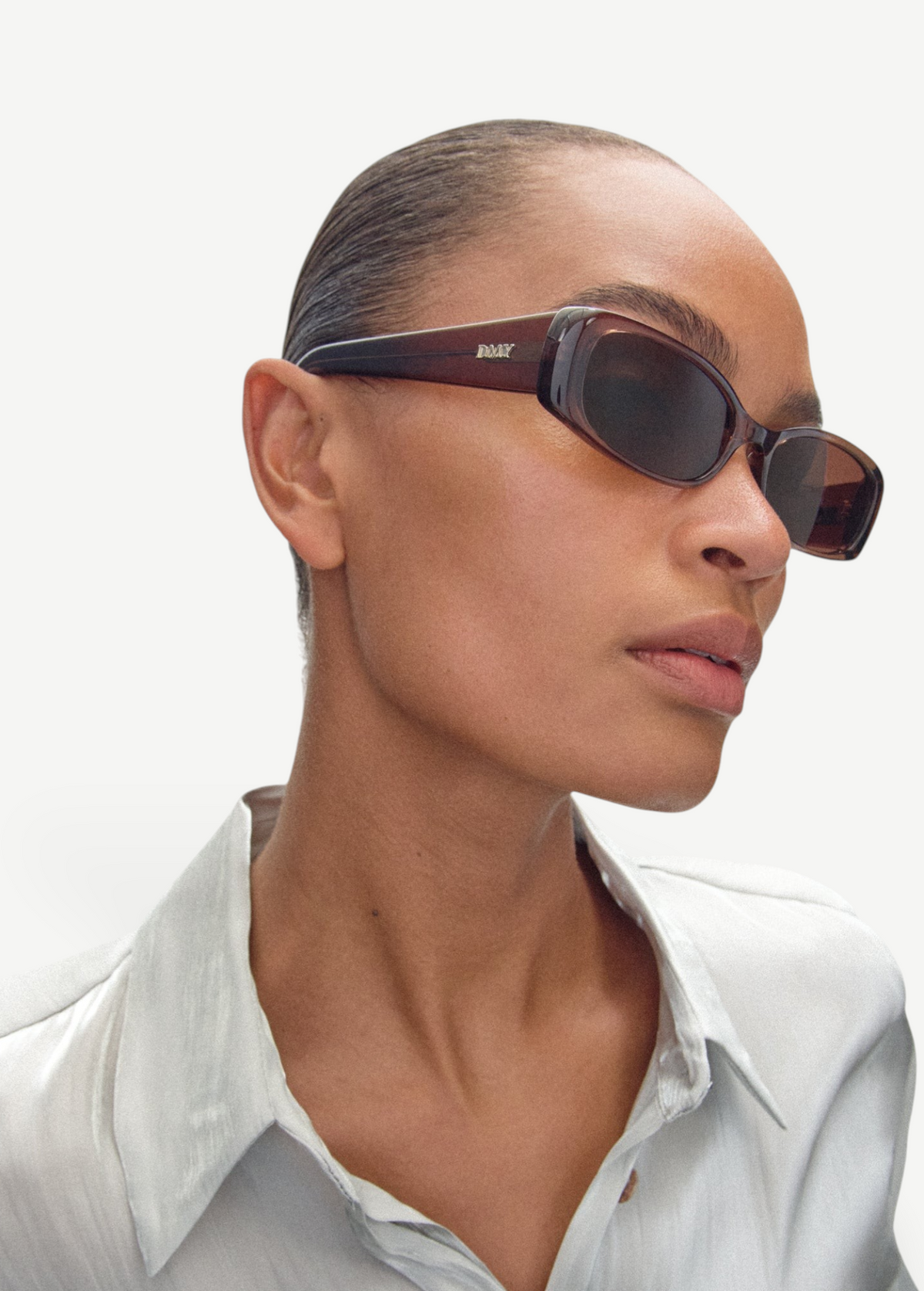 KABE Billy rectangular sunglasses in brown acetate worn by a model in a white shirt