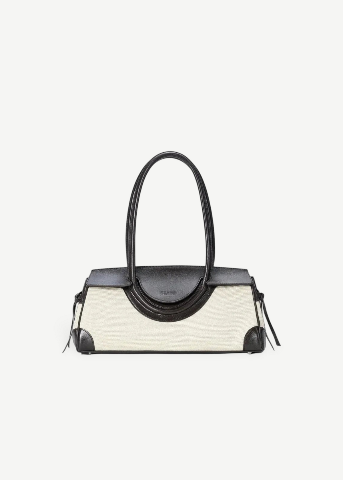 KABE SHOP INC Maude shoulder bag featuring a structured cream canvas body with dark brown leather trim and handles.