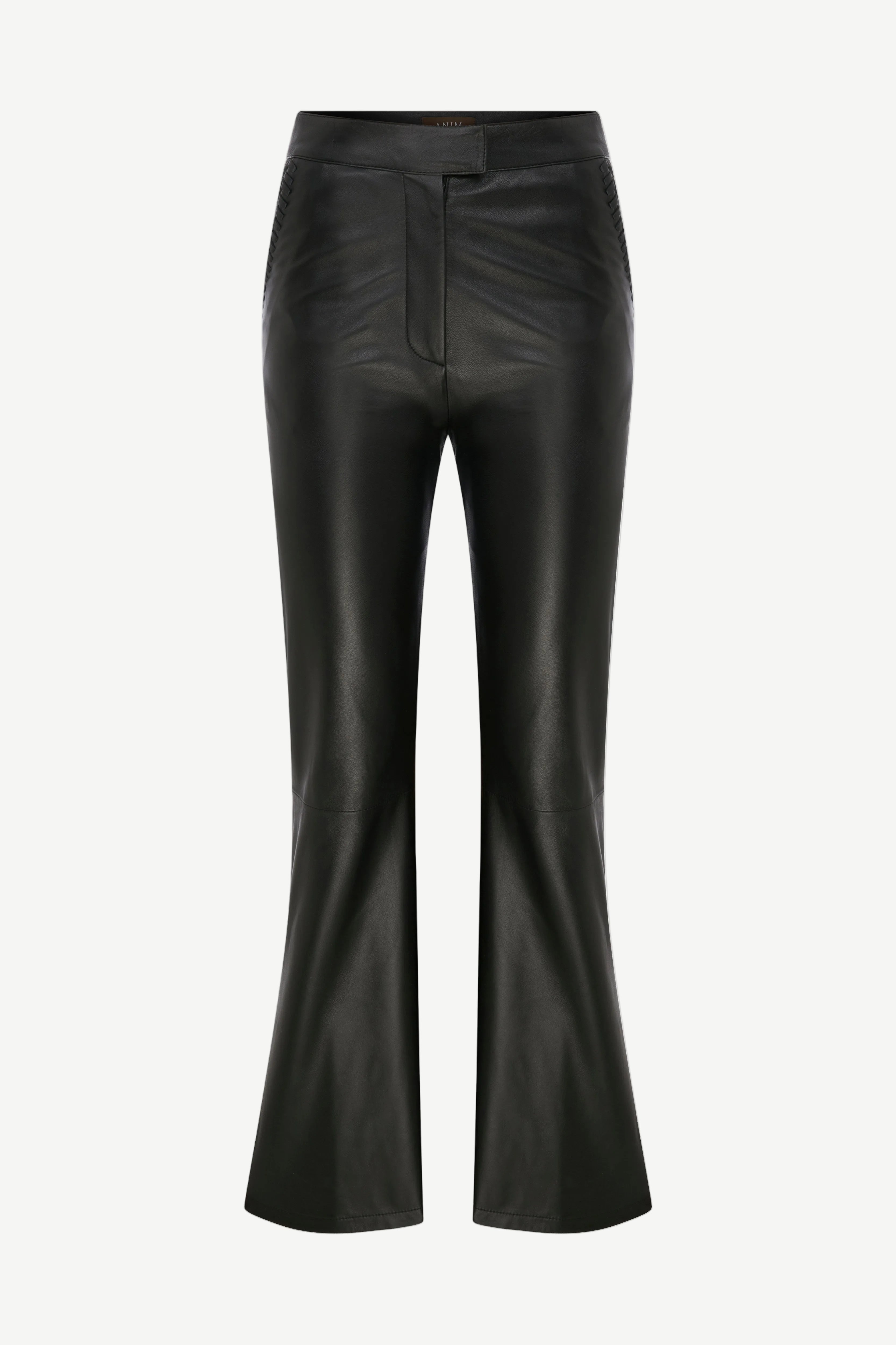 The Xena Pants are black leather flared pants with a front fly, fitted through the hips and thighs, and a slight flare at the hem. Displayed against a white background, they are shown in full length from waist to hem.
