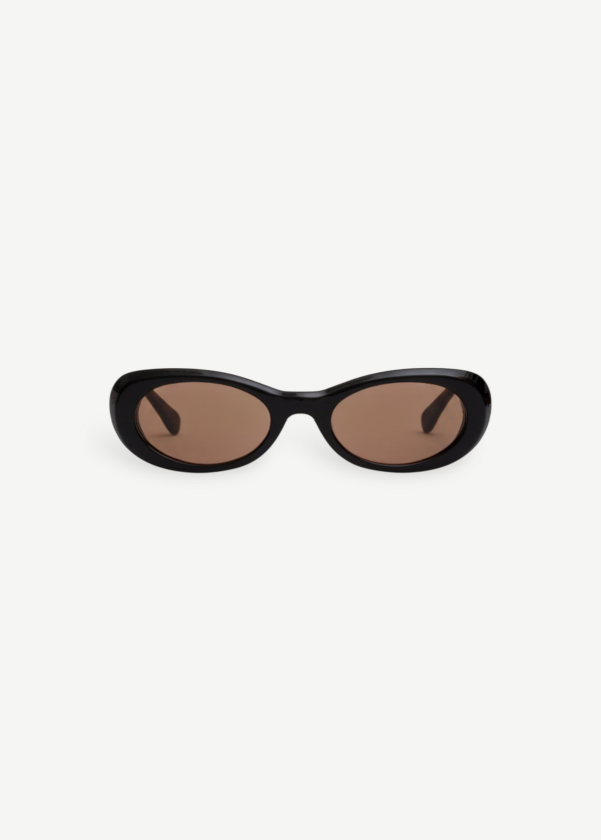 KABE SHOP INC Naomi sunglasses featuring an exaggerated black oval cellulose acetate frame and tinted lenses.