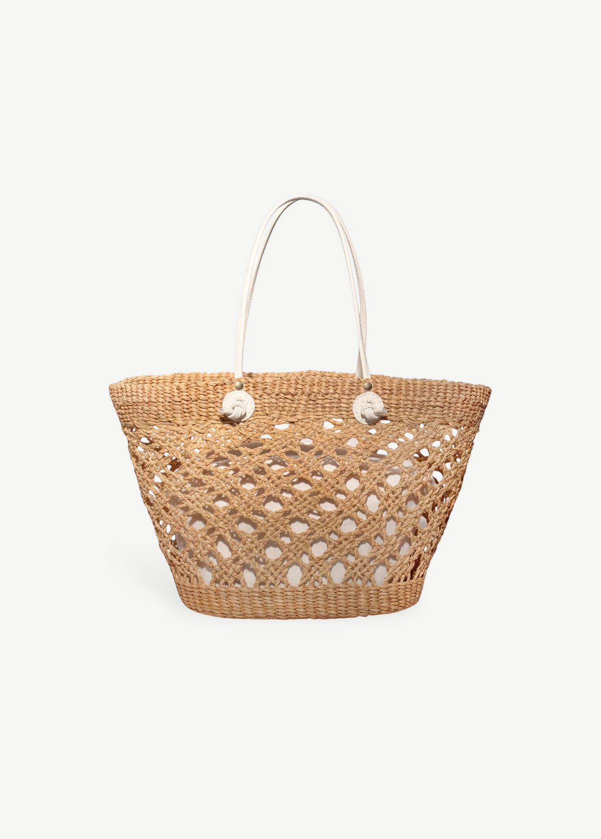 KABE SHOP INC handcrafted Toquilla straw beach basket bag with an open weave design and white leather handles.