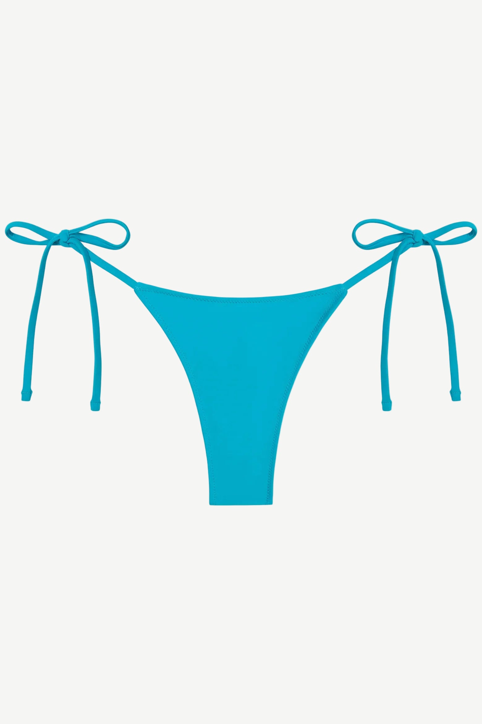 The Praia Bottom is a bright blue bikini bottom featuring a high-cut front and adjustable side string ties, crafted from regenerated nylon for an eco-friendly swimwear choice and displayed against a plain white background.