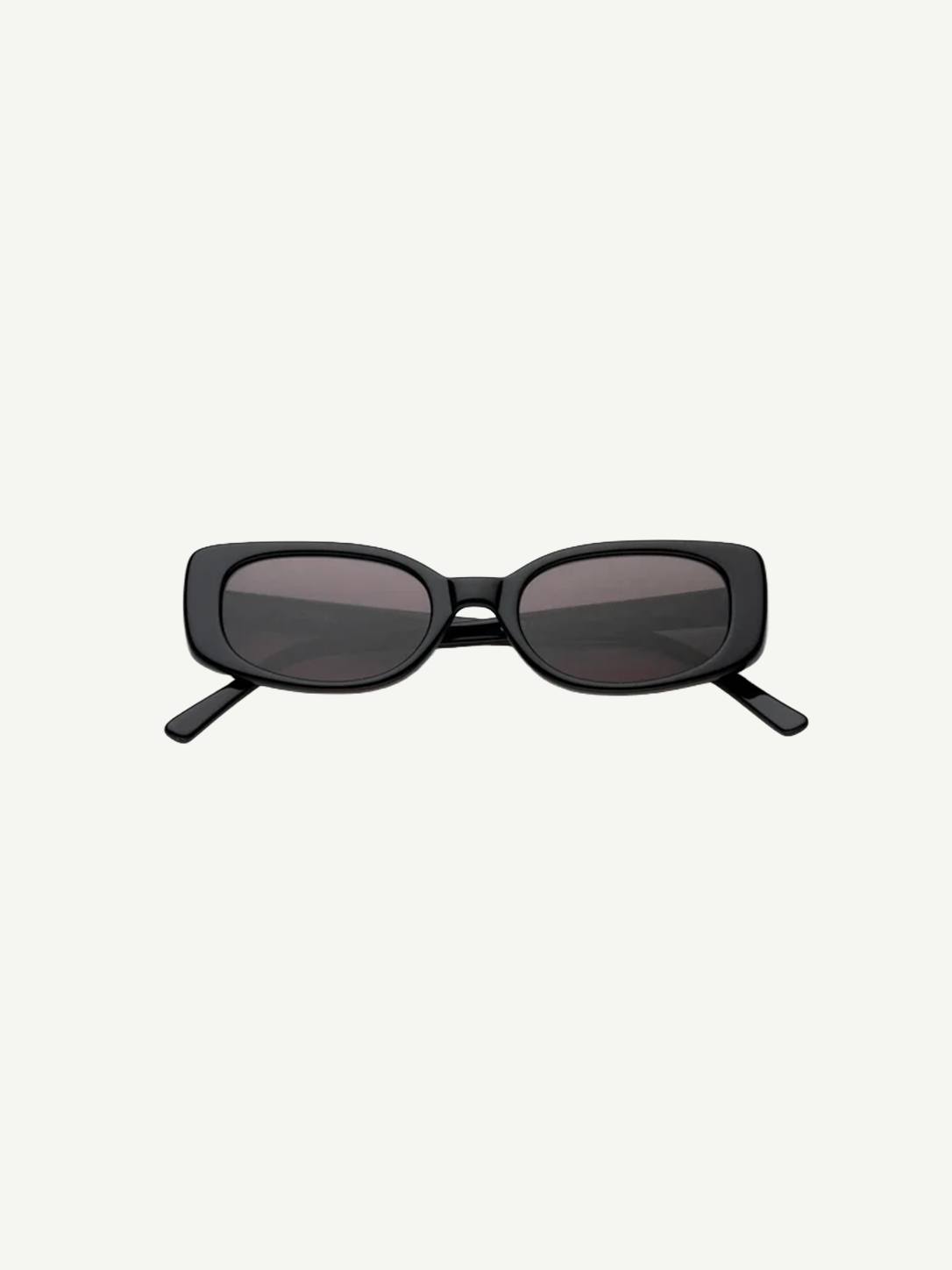 The Solene sunglasses feature a black slim rectangular frame with dark tinted lenses that provide 100% UV protection, displayed front-facing against a plain white background.