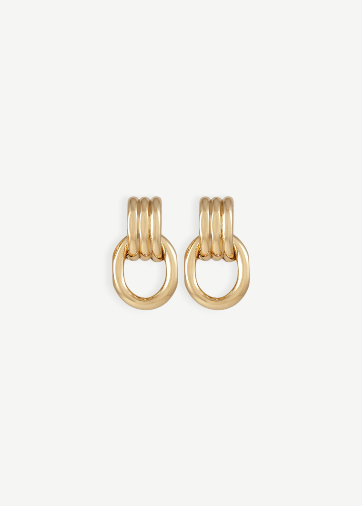 Elsa Earrings feature a pierced back and three rounded gold-plated bars stacked above a thick, oval-shaped loop, shown against a plain white background. Crafted with 14KT gold plating, these earrings are stylish, lightweight, and ideal for everyday wear.