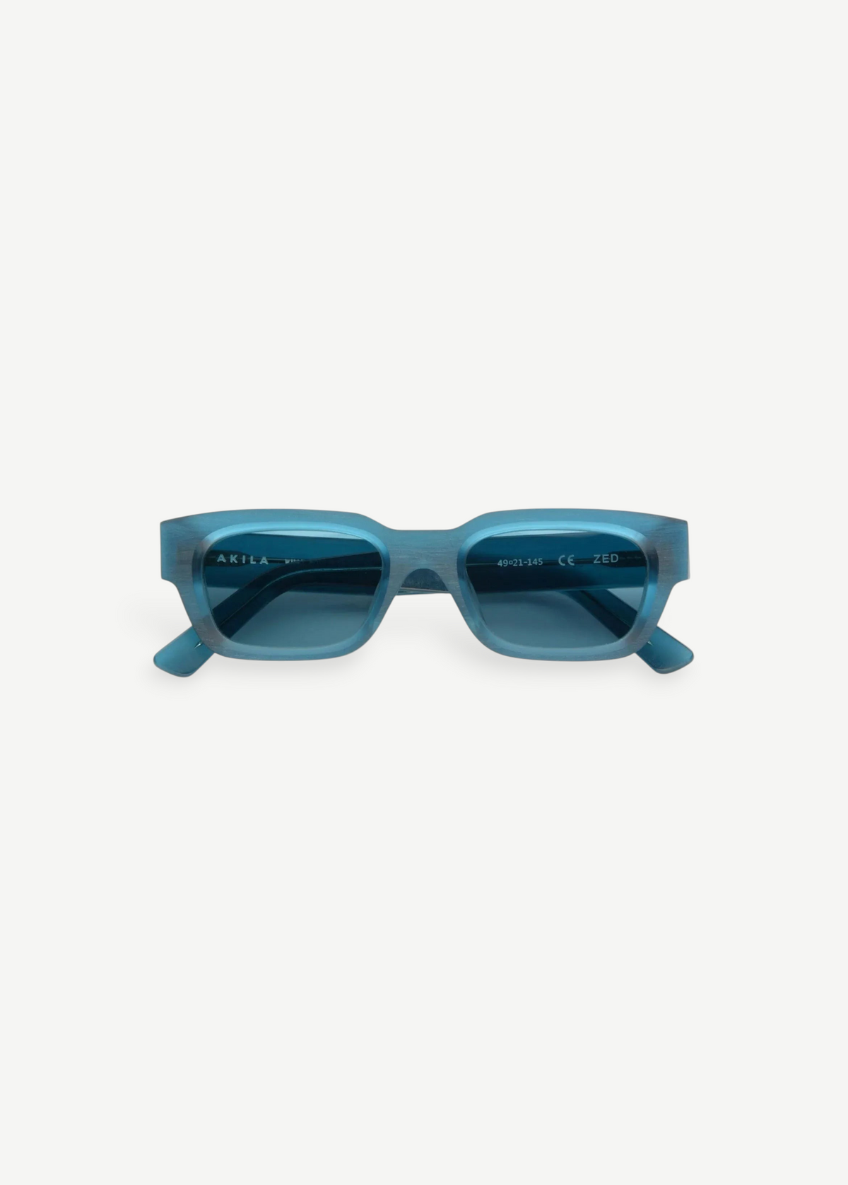 KABE Zed sunglasses featuring a retro-inspired blue translucent wraparound frame from the AKILA RAW collection
