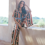 KABE SHOP INC Nera shirt featuring a brown and white ikat print with blue crochet detailing in an oversized fit.