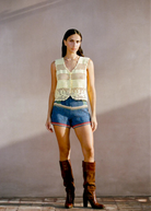 KABE SHOP INC Nova Shorts featuring multicolored floral crochet motifs in a relaxed, artisanal vacation style.