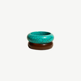 KABE SHOP INC resin bangle set featuring one turquoise crackle-patterned bracelet and one solid brown bangle