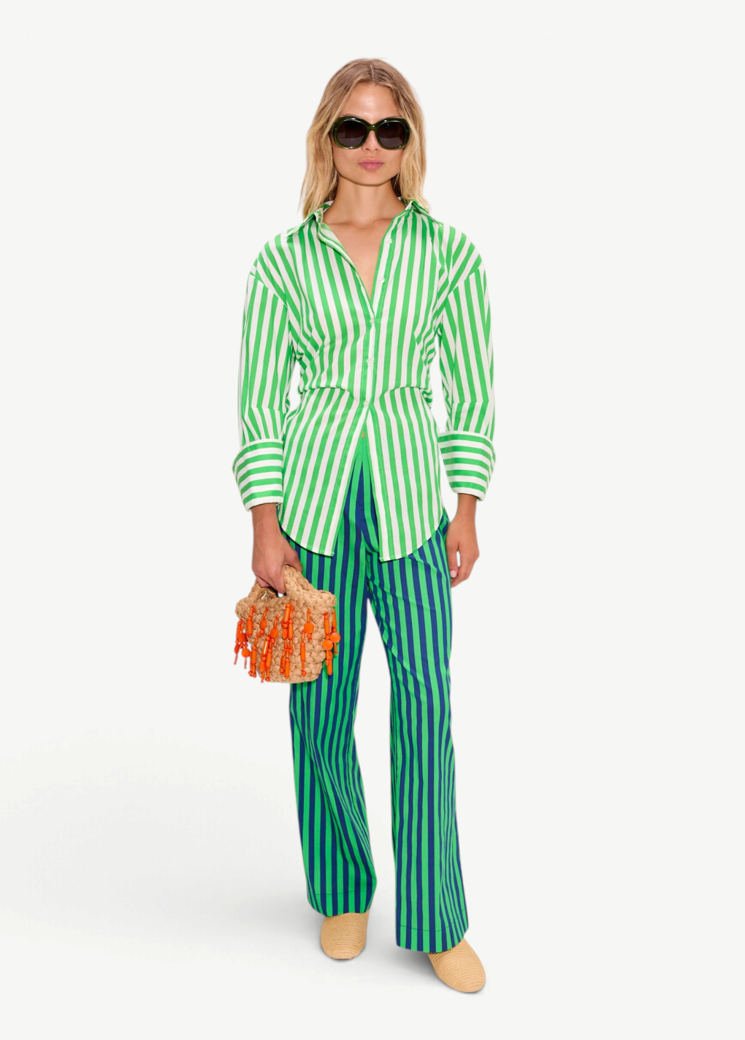 Model wearing KABE SHOP INC Loch Poplin Button Up in green and white stripes with matching striped trousers