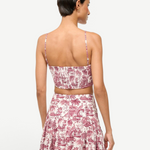 Model wearing KABE SHOP INC Federico cropped tank top with pink and white toile de jouy print, back view