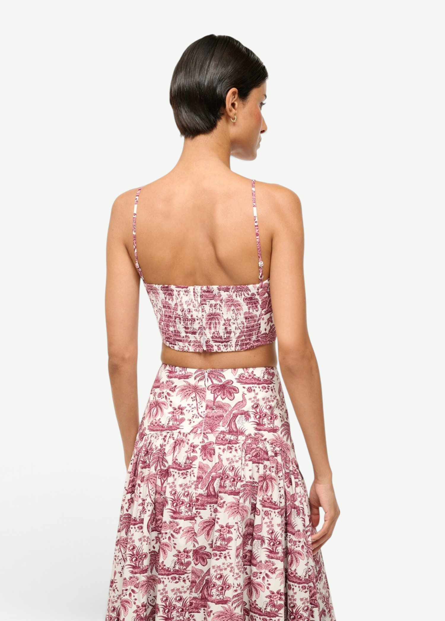 Model wearing KABE SHOP INC Federico cropped tank top with pink and white toile de jouy print, back view
