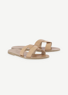 KABE SHOP INC Desmos sandals in beige leather featuring an elegant interlocking strap design for comfort.