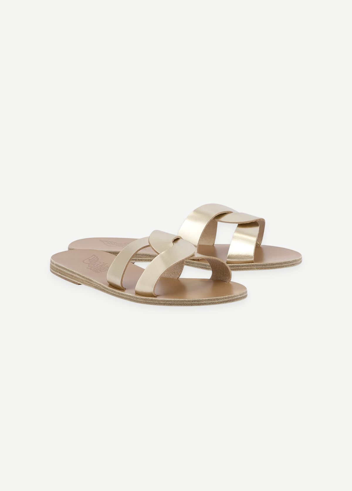 KABE SHOP INC Desmos sandals in metallic gold leather with elegant interlocking straps and a flat sole.