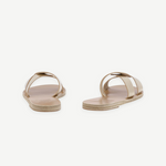 KABE SHOP INC Desmos sandals featuring beige leather interlocking straps and a flat sole for everyday comfort.