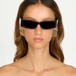 KABE SHOP INC Colbi earrings featuring a bold geometric square design with a sleek silver-plated finish on a model