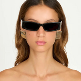 KABE SHOP INC Colbi earrings featuring a bold geometric square design with a sleek silver-plated finish on a model