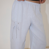 Light blue, straight-leg Deiji Studios Eyelet Pant with a drawstring eyelet detail on the right thigh.
