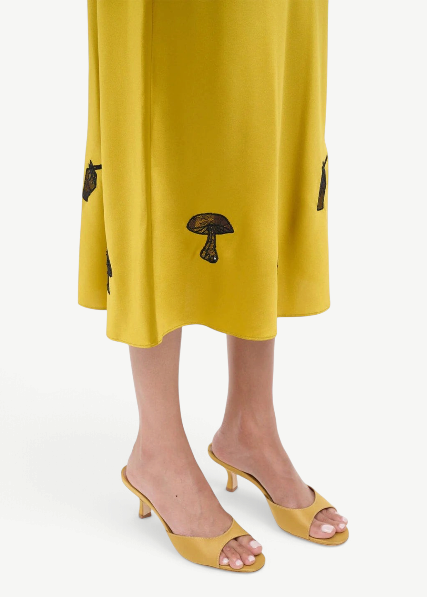 KABE SHOP INC Brigitte mule heels in mustard yellow satin paired with a matching midi skirt featuring mushroom motifs