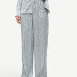 Sage green Nami Pant featuring a high-waisted, wide-leg design with a textured, crinkled finish in a relaxed silhouette.