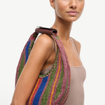 KABE SHOP INC Moon Tote bag featuring a multi-colored striped woven design with a brown leather shoulder strap