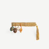 KABE SHOP INC Jibe belt in natural woven straw with detachable decorative seashells and a hanging tassel detail
