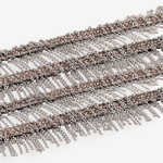 Close-up of several rows of thin metallic chains in white bronze hanging in layers, creating a fringe pattern reminiscent of the Lariat Necklace White Bronze, set against a white background.