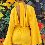 KABE SHOP INC Mini Florida dress in bright yellow with long bell sleeves and a large back bow, back view