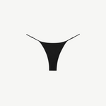 The Luna Bottom is a black low-rise bikini bottom featuring thin adjustable straps and crafted from ECONYL® regenerated nylon, showcased against a white background.
