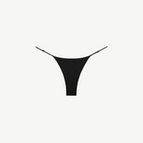 The Luna Bottom is a black low-rise bikini bottom featuring thin adjustable straps and crafted from ECONYL® regenerated nylon, showcased against a white background.