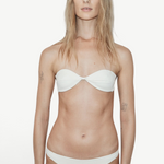 Model wearing KABE SHOP INC white Classic Bottom bikini with a matching strapless top against a plain white background