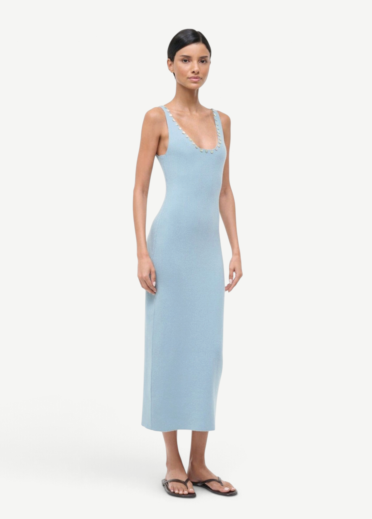 Light blue ribbed Neva Dress in a midi length with a scoop neckline accented by silver studs for a sophisticated, timeless style.