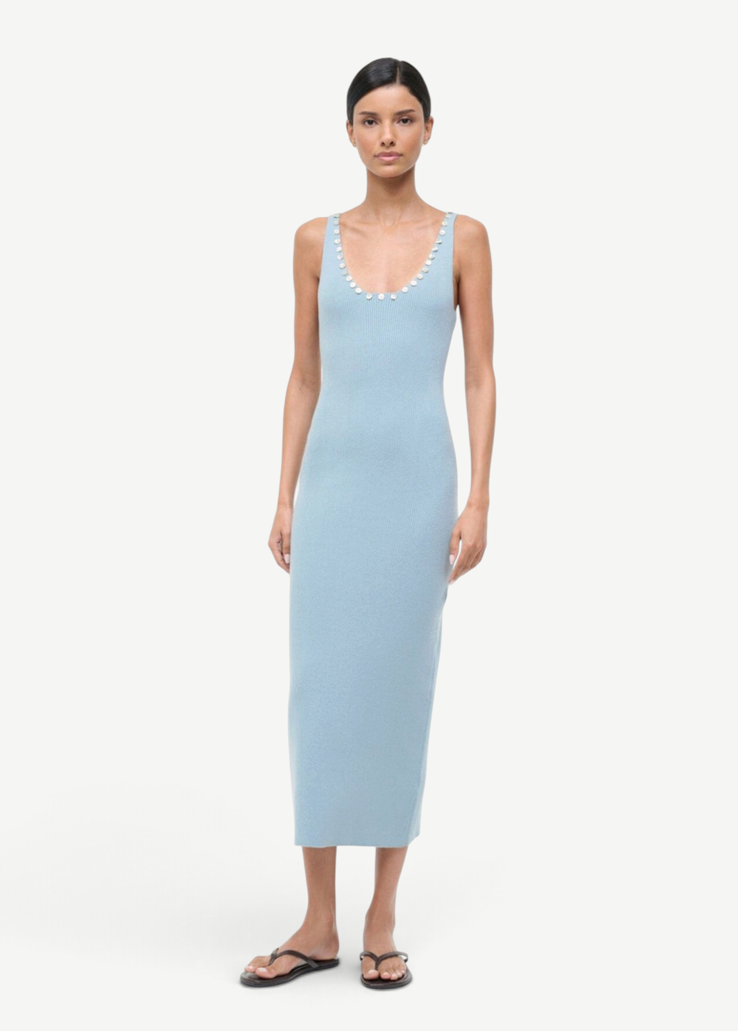 Light blue ribbed Neva Dress in a midi length with a scoop neckline and white button details.