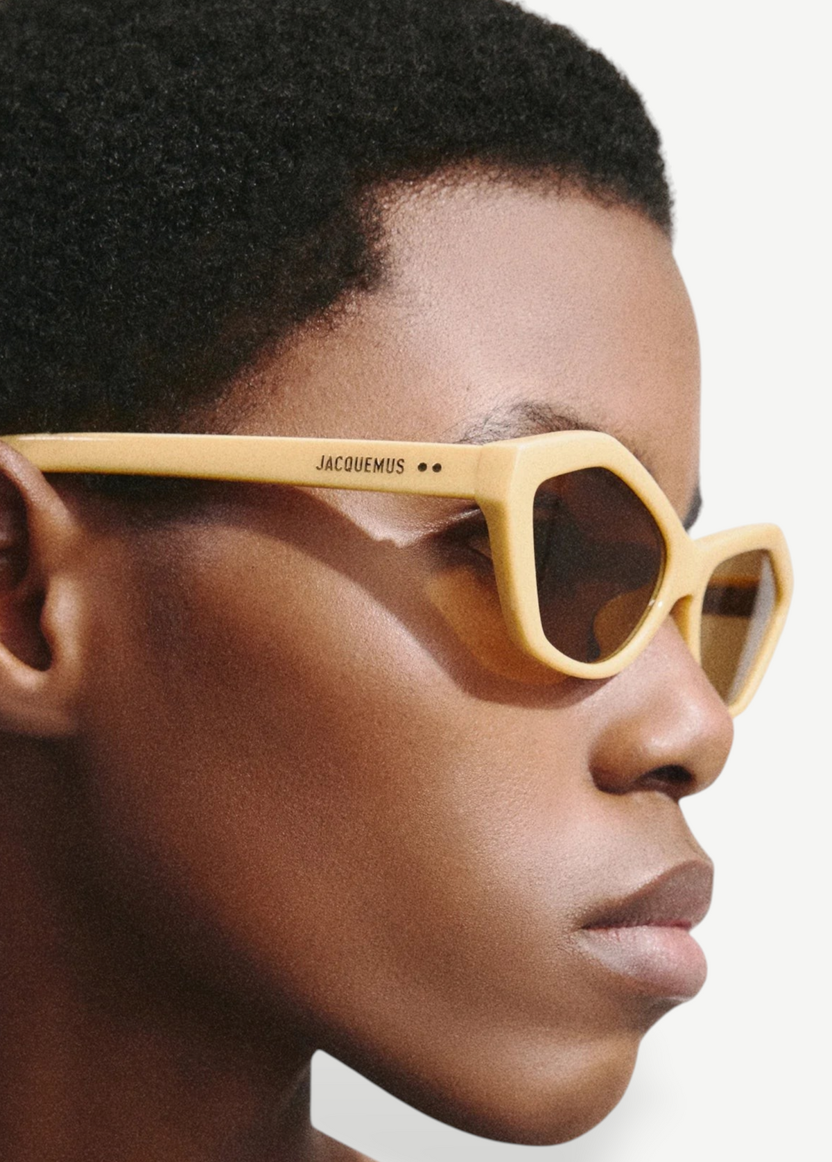 KABE SHOP INC Bambino sunglasses in beige acetate with tobacco lenses and gold temple details on a model
