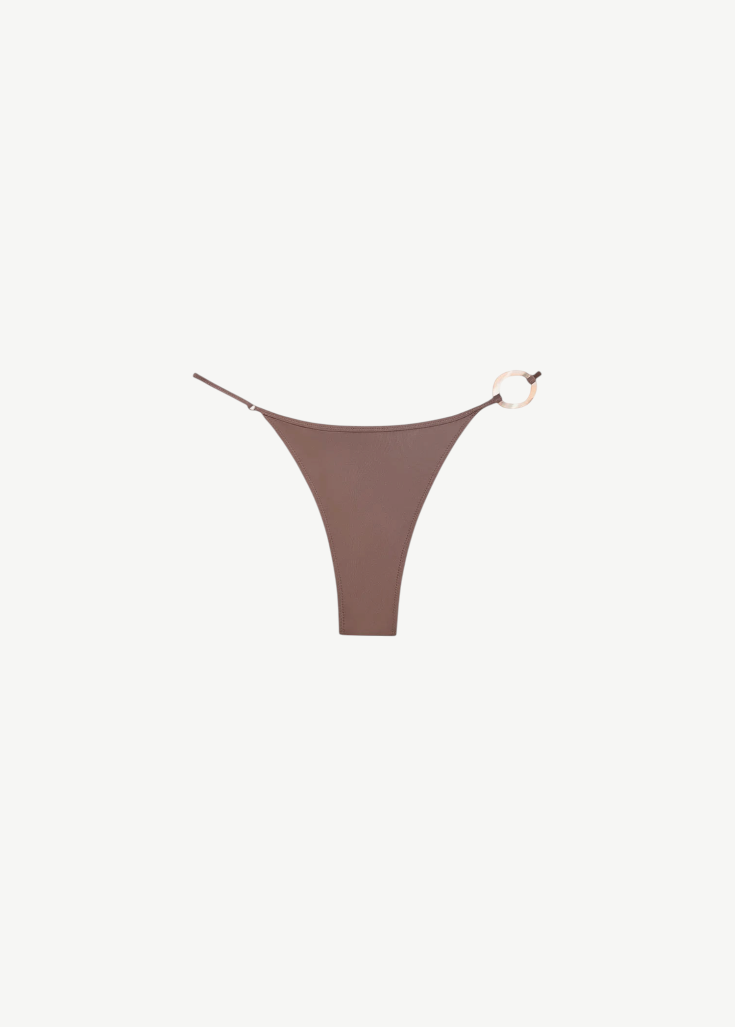 The Orb Luna Bottom is a brown high-cut bikini bottom crafted from ECONYL® regenerated nylon, featuring thin adjustable straps and a decorative gold ring detail on the right side, displayed on a white background.