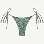 Praia Bottom made from recycled nylon swimwear material, featuring a leaf-inspired print and beaded tie side strings, shown on a white background.