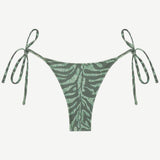Praia Bottom made from recycled nylon swimwear material, featuring a leaf-inspired print and beaded tie side strings, shown on a white background.