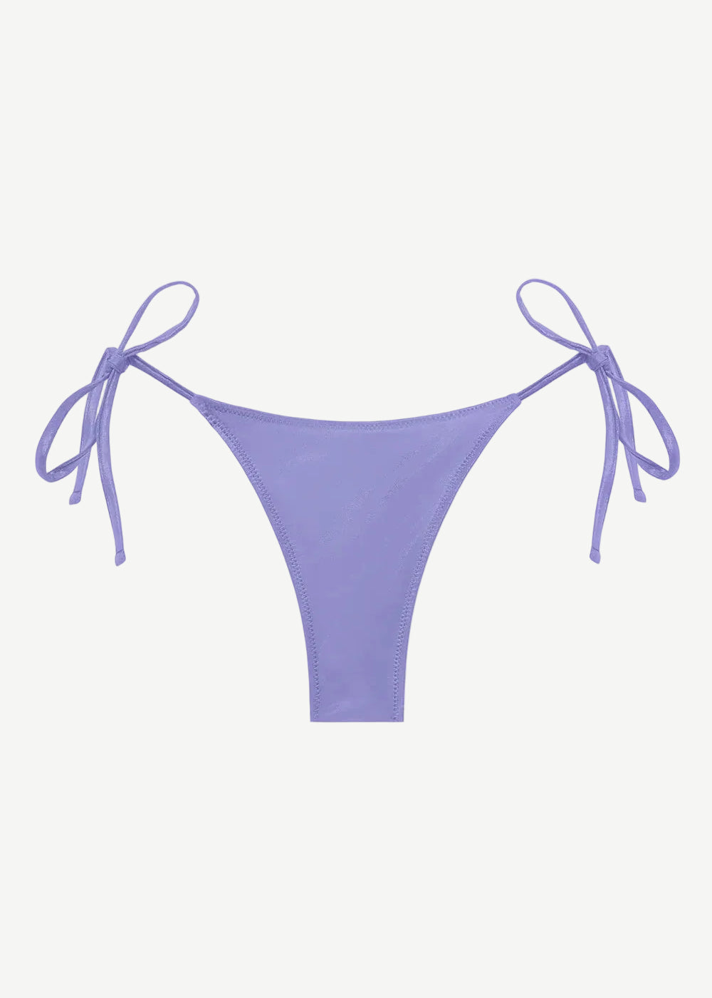 The Praia Bottom, an adjustable tie bikini bottom in a soft lavender shade and crafted from regenerated nylon for enhanced comfort, is showcased against a plain white background—a perfect option for anyone looking for eco-friendly swimwear with a customizable fit.