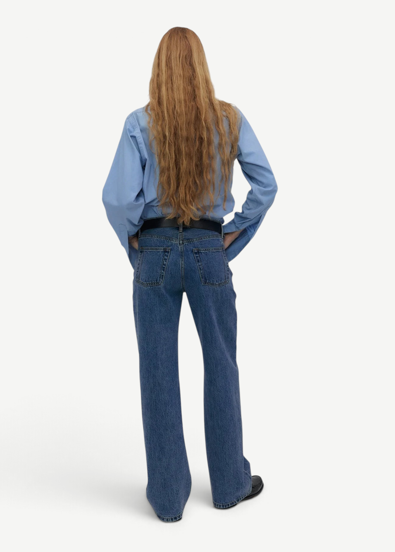 KABE SHOP INC Everyday Jeans in blue denim with a relaxed fit worn by a woman with long hair from the back view