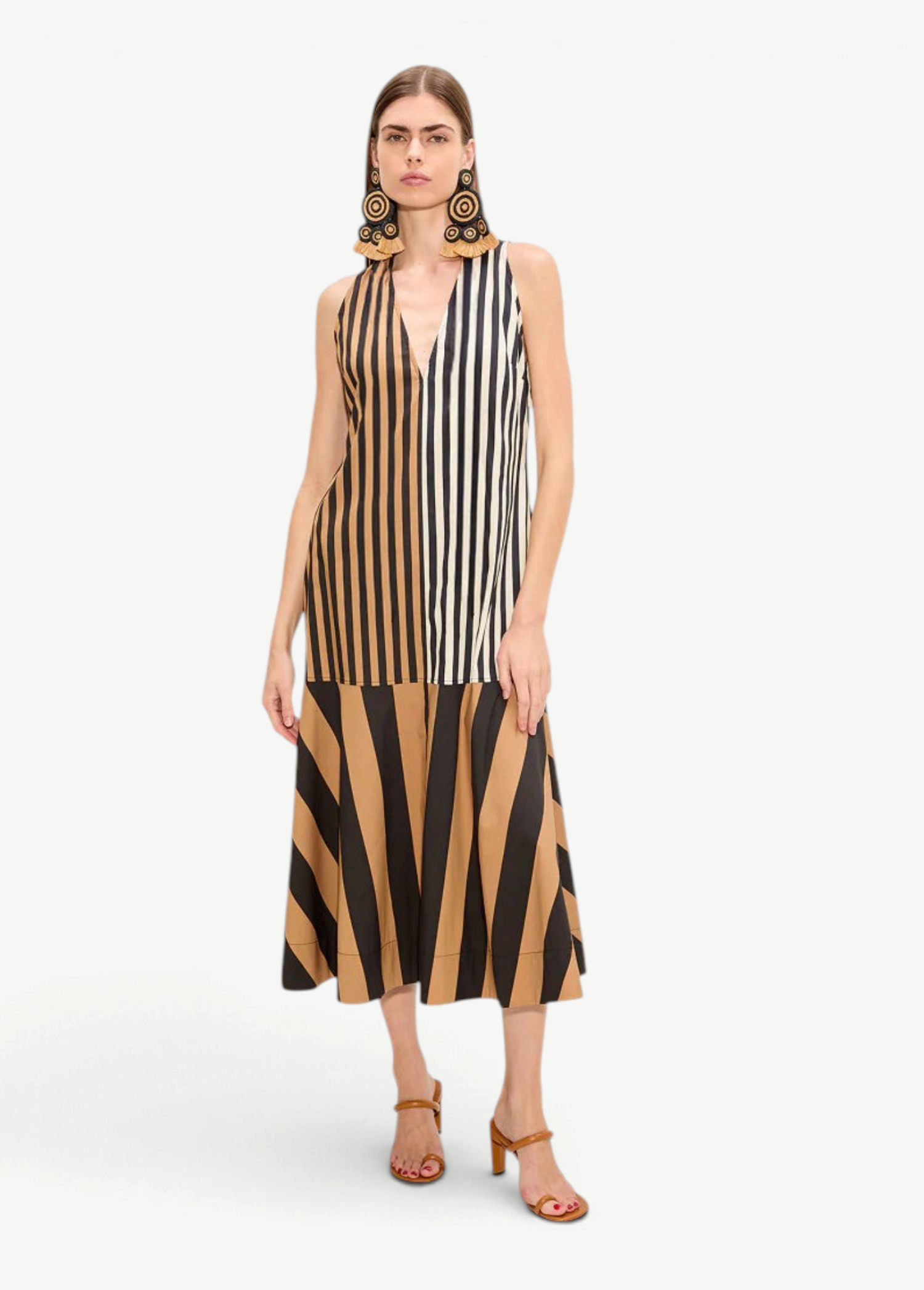 Model wearing KABE SHOP INC Celeste poplin midi dress with brown and white vertical stripes and deep V-neckline