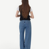 Woman wearing KABE SHOP INC Sport Jean in relaxed blue denim with patch pockets, viewed from the back