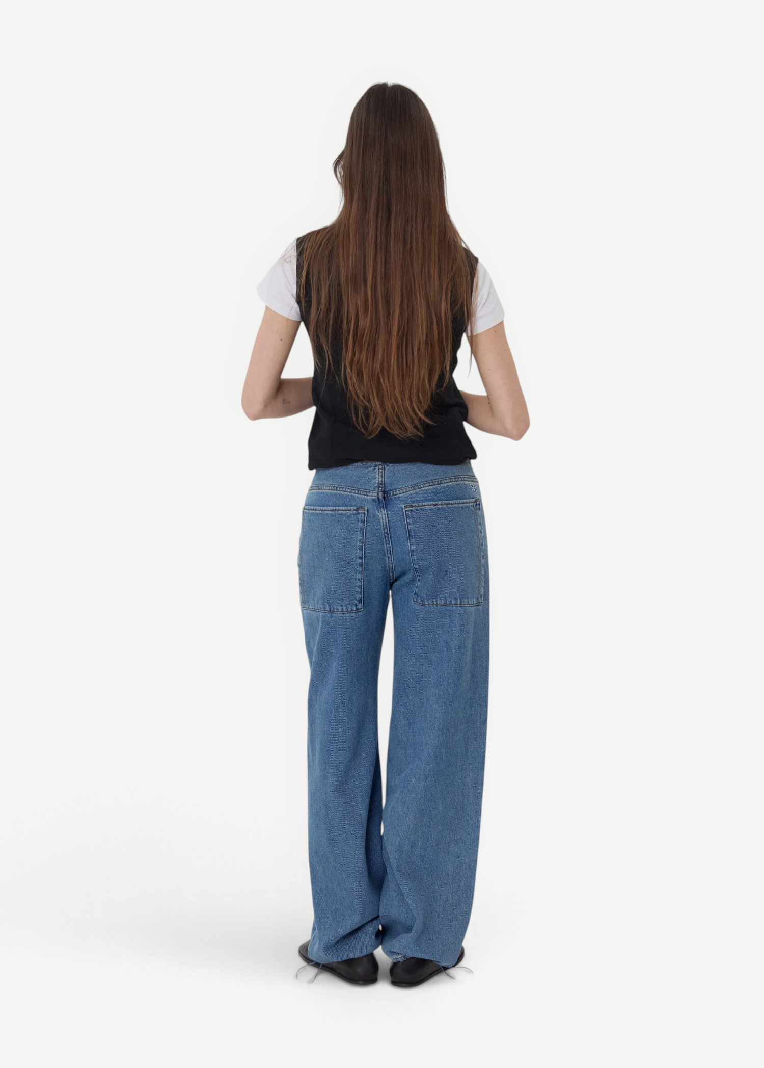 Woman wearing KABE SHOP INC Sport Jean in relaxed blue denim with patch pockets, viewed from the back