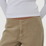 KABE SHOP INC Sport Jean in tan denim with a relaxed fit worn with a white long-sleeve top
