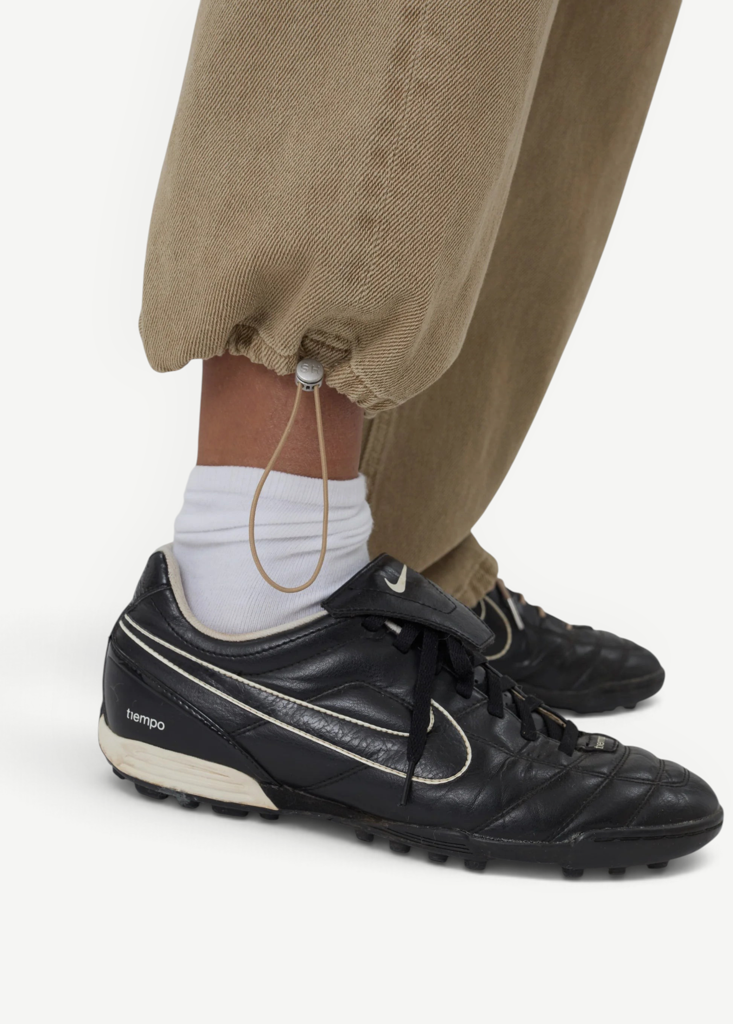 KABE SHOP INC Sport Jean in tan denim with a relaxed fit, featuring an adjustable drawstring toggle at the ankle.
