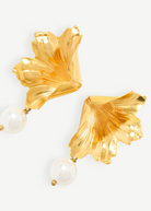 KABE SHOP INC Sonia Petunia Pearl earrings featuring gold-plated sculptural floral designs and freshwater pearls.