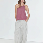 KABE SHOP INC Deiji Studios mauve linen one-shoulder Half Halter top with gathered neckline on a model