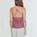 KABE SHOP INC Deiji Studios mauve linen one-shoulder top with back tie detail worn by a model from the back view